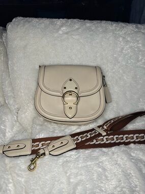 Coach Cream Crossbody Saddle Bag with Brown Patterned Strap